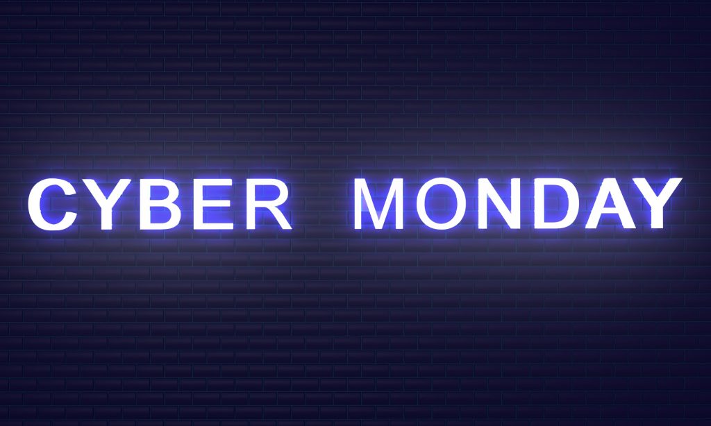 cyber monday text calligraphy light bright brick wall background concrete violet purple color black