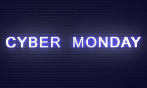 cyber monday text calligraphy light bright brick wall background concrete violet purple color black